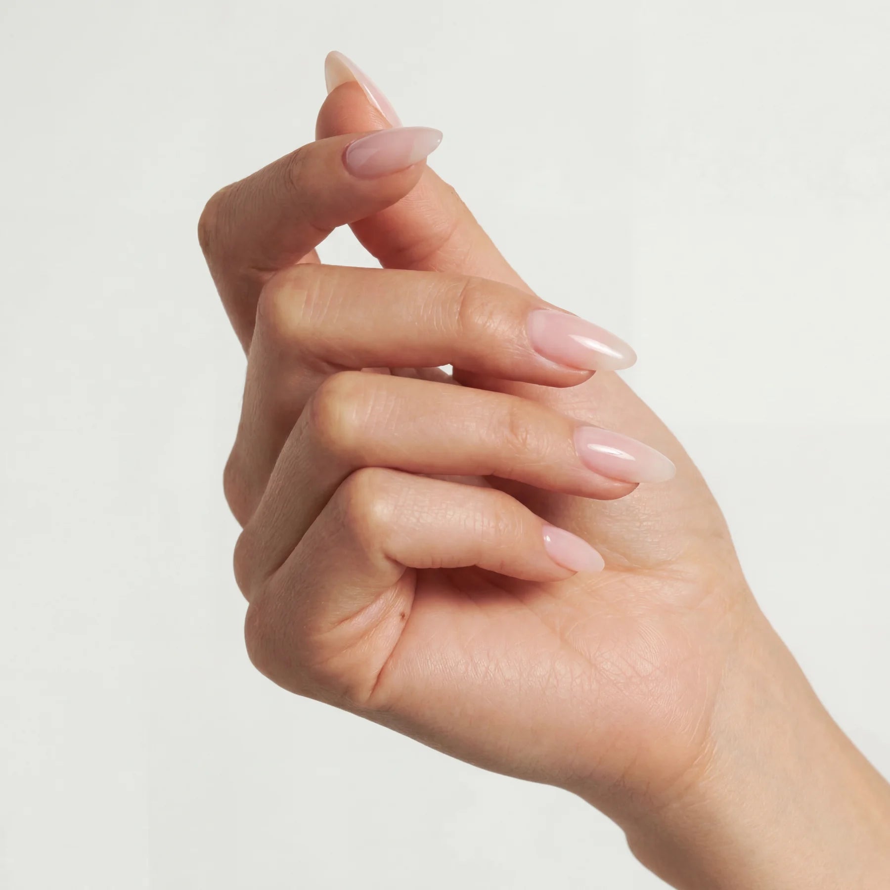 Hand showcasing GLAMRDiP gel nails